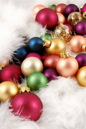 simsearch:400-04499144,k - Pile of Christmas ornaments nestled in white feathers Stock Photo - Budget Royalty-Free & Subscription, Code: 400-04499148