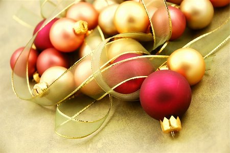 simsearch:400-04499144,k - Christmas ornaments on paper surrounded by ribbon Stock Photo - Budget Royalty-Free & Subscription, Code: 400-04499143