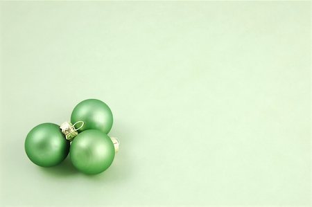 simsearch:400-04499144,k - Green Christmas ornaments on a pale green background with copyspace Stock Photo - Budget Royalty-Free & Subscription, Code: 400-04499150
