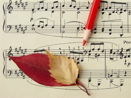 stave art - old sheet of musical symbols with colorful autumnal leaves and red pencil fragment Stock Photo - Budget Royalty-Free & Subscription, Code: 400-04499372