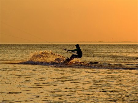 simsearch:400-03992760,k - Silhouette of a kitesurf on a gulf on a sunset 2 Stock Photo - Budget Royalty-Free & Subscription, Code: 400-04504977