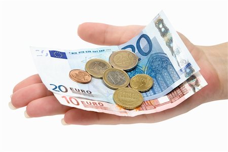 simsearch:693-06021323,k - Female hand holding Euro banknotes and coins. Isolated on a white background. Stock Photo - Budget Royalty-Free & Subscription, Code: 400-04507703