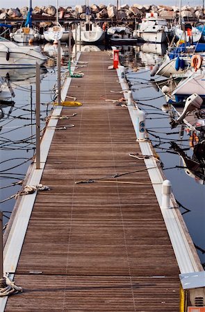simsearch:400-04433053,k - Rows of sailboats docked in harbor Stock Photo - Budget Royalty-Free & Subscription, Code: 400-04509346