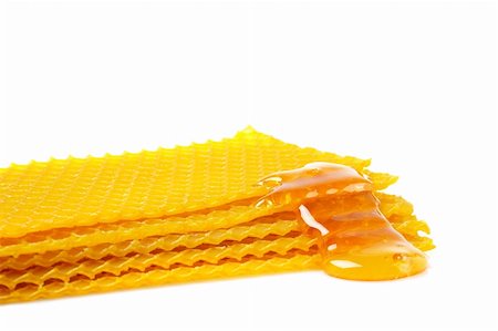 simsearch:400-05135233,k - A honeycomb with honey, soft shadow on white background Foto de stock - Super Valor sin royalties y Suscripción, Código: 400-04501303