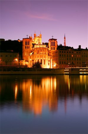 st jean - The Notre Dame de Fourviere basilica and the St. Jean cathedral both illuminated and reflected on the waters of the river Saone, in Lyon, France Stock Photo - Budget Royalty-Free & Subscription, Code: 400-04501363