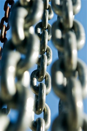 Group of chains against a blue sky Stock Photo - Budget Royalty-Free & Subscription, Code: 400-04502073