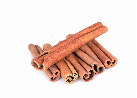 simsearch:628-02228100,k - Cinnamon sticks tower on a white background Stock Photo - Budget Royalty-Free & Subscription, Code: 400-04503430