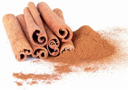 simsearch:628-02228100,k - Cinnamon powder and sticks on white backhround Stock Photo - Budget Royalty-Free & Subscription, Code: 400-04503431