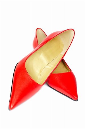 Lady red shoes isolated on white background. Shallow depth of file Stock Photo - Budget Royalty-Free & Subscription, Code: 400-04515158