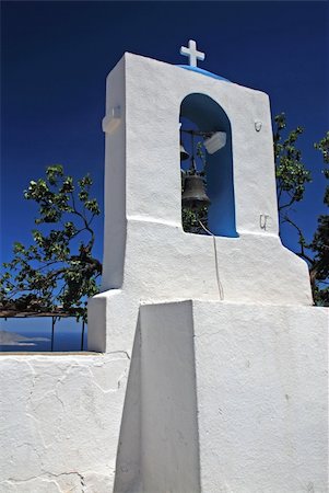 simsearch:400-04898640,k - Belfry of the church in Zia - mountain village on Greek island Kos Stock Photo - Budget Royalty-Free & Subscription, Code: 400-04515595