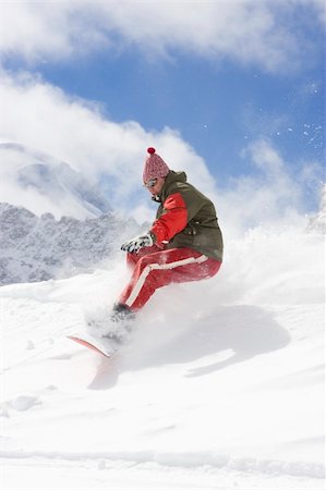simsearch:400-03985663,k - snowboarder taking jump in fresh powder snow Stock Photo - Budget Royalty-Free & Subscription, Code: 400-04518108