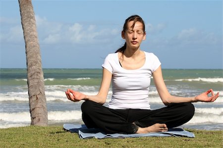 relaxing and breath exercise on the beach Stock Photo - Budget Royalty-Free & Subscription, Code: 400-04519412