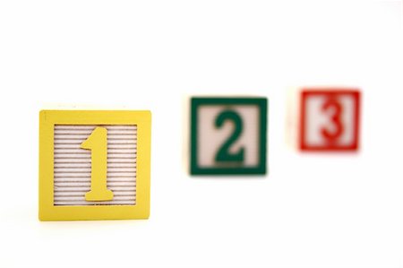 simsearch:600-02346205,k - three alphabet blocks with number one, two and three over a white surface Stock Photo - Budget Royalty-Free & Subscription, Code: 400-04519731