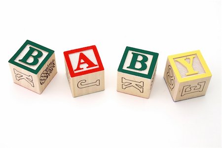 simsearch:600-02346205,k - word baby formed by alphabet wood blocks on a white surface Stock Photo - Budget Royalty-Free & Subscription, Code: 400-04519771