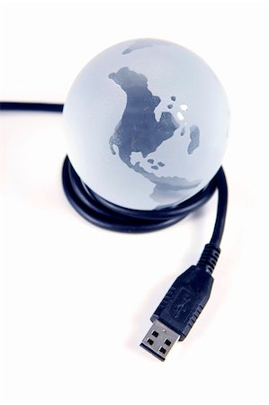 Glass globe with USB cable on white background Stock Photo - Budget Royalty-Free & Subscription, Code: 400-04524261