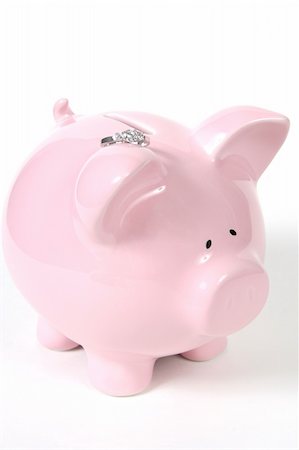 simsearch:400-06077471,k - Pink Piggy Bank with Wedding Ring, isoalted on white background Stock Photo - Budget Royalty-Free & Subscription, Code: 400-04524649