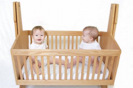 simsearch:400-05153083,k - Little Baby set of Twins in crib - only one baby! Stock Photo - Budget Royalty-Free & Subscription, Code: 400-04524697