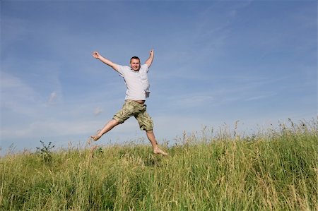 simsearch:400-03934248,k - happy man relaxing on meadow Stock Photo - Budget Royalty-Free & Subscription, Code: 400-04525309