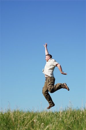simsearch:400-03934248,k - happy man jumping on sky background Stock Photo - Budget Royalty-Free & Subscription, Code: 400-04527781