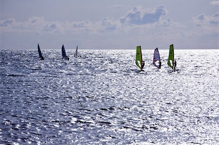 simsearch:400-03992760,k - Seven windsurfers are at the Mediterranean Sea, Israel Stock Photo - Budget Royalty-Free & Subscription, Code: 400-04529108