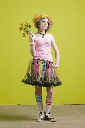 simsearch:400-04016564,k - Pretty young woman with colorful punk clothes with plastic flowers. Stock Photo - Budget Royalty-Free & Subscription, Code: 400-04520676