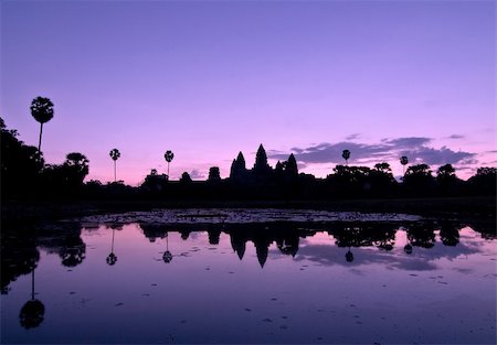 simsearch:400-04592511,k - The  silhouette of Angkor Wat reflected in the water at sunrise is worth waking up early for. Stock Photo - Budget Royalty-Free & Subscription, Code: 400-04522872