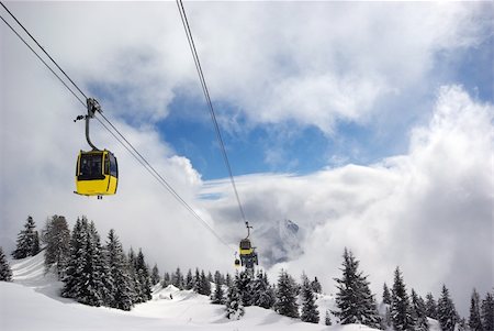 simsearch:400-03985663,k - Ski lift during winter time in Austrian Alps Stock Photo - Budget Royalty-Free & Subscription, Code: 400-04536385