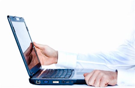 simsearch:400-04125018,k - View of hands playing with  laptop on white background Stock Photo - Budget Royalty-Free & Subscription, Code: 400-04538519