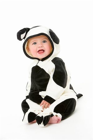 dairy cows looking at camera - Baby in cow costume Stock Photo - Budget Royalty-Free & Subscription, Code: 400-04539458