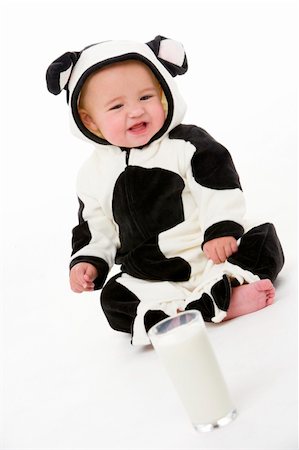 dairy cows looking at camera - Baby in cow costume Stock Photo - Budget Royalty-Free & Subscription, Code: 400-04539460