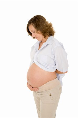 Caucasian woman who is 9 months pregnant on white background Stock Photo - Budget Royalty-Free & Subscription, Code: 400-04532261