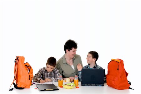 simsearch:400-05749563,k - two young boys doing together studying and homework with the support of the mother Stock Photo - Budget Royalty-Free & Subscription, Code: 400-04533056