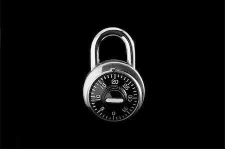 Combination lock on black background. Stock Photo - Budget Royalty-Free & Subscription, Code: 400-04533130