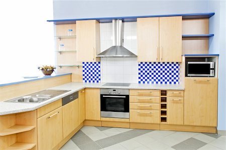 Complete wooden kitchen with blue details horizontal Stock Photo - Budget Royalty-Free & Subscription, Code: 400-04533209