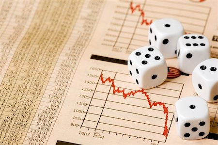 simsearch:400-08408451,k - Dice and stock market charts in the newspaper Stock Photo - Budget Royalty-Free & Subscription, Code: 400-04546607