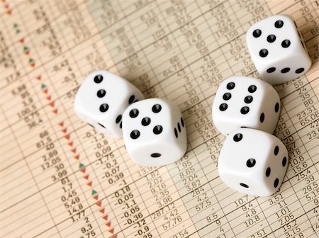 simsearch:400-08408451,k - Dice and stock market charts in the newspaper Stock Photo - Budget Royalty-Free & Subscription, Code: 400-04546608
