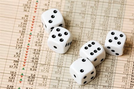 simsearch:400-08408451,k - Dice and stock market charts in the newspaper Stock Photo - Budget Royalty-Free & Subscription, Code: 400-04546609