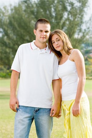 beautiful young couple holding hands outdoors Stock Photo - Budget Royalty-Free & Subscription, Code: 400-04549301