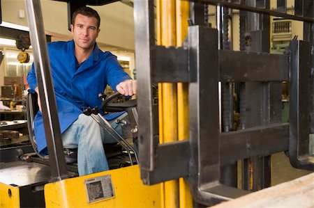 Warehouse worker in forklift Stock Photo - Budget Royalty-Free & Subscription, Code: 400-04540962