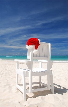 simsearch:400-03991814,k - Santa's hat and chair on the beach Stock Photo - Budget Royalty-Free & Subscription, Code: 400-04541892