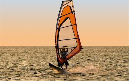 simsearch:400-03992760,k - Silhouette of a windsurfer on the sea Stock Photo - Budget Royalty-Free & Subscription, Code: 400-04554305