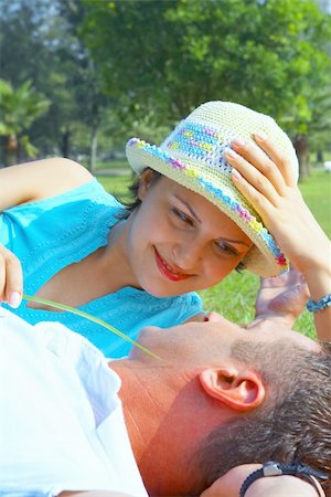 a portrait of attractive couple in summer environment Stock Photo - Budget Royalty-Free & Subscription, Code: 400-04556162