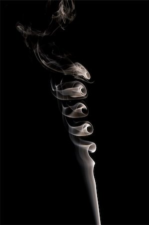 simsearch:400-05147209,k - abstract shape made of smoke over black textile background Photographie de stock - Aubaine LD & Abonnement, Code: 400-04556566
