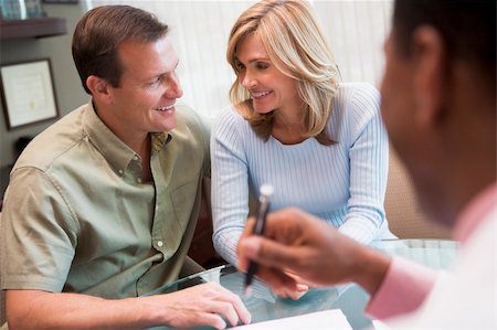 fertility clinic - Couple in consultation at IVF clinic talking to doctor Stock Photo - Budget Royalty-Free & Subscription, Code: 400-04556694