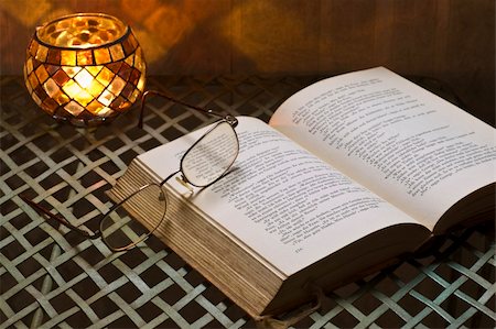 horizontal picture of an old book. Some glasses are laying on it. Stock Photo - Budget Royalty-Free & Subscription, Code: 400-04557069