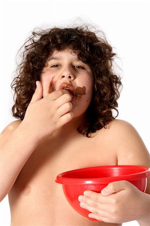 fat kid at school - funny face, dingy boy enjoying eating chocolate Stock Photo - Budget Royalty-Free & Subscription, Code: 400-04558144