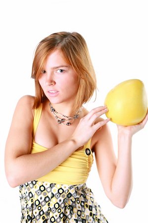 simsearch:400-05062363,k - Girl holds in really big citrus fruit - pamelo Stock Photo - Budget Royalty-Free & Subscription, Code: 400-04559130