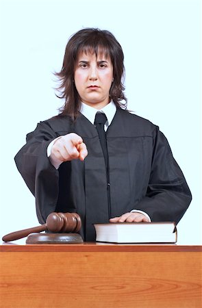 simsearch:700-00028739,k - Angry female judge pointing at you in a courtroom. Focus on gavel and shallow depth of field Stock Photo - Budget Royalty-Free & Subscription, Code: 400-04559545