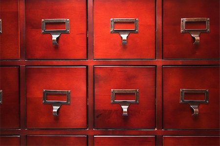 simsearch:400-06072564,k - Lustrous Wooden Card File Cabinet in Dramatic LIght Stock Photo - Budget Royalty-Free & Subscription, Code: 400-04553081