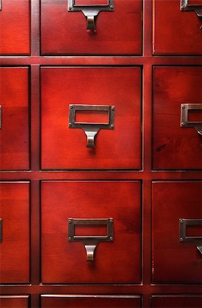 simsearch:400-06072564,k - Lustrous Wooden Card File Cabinet in Dramatic LIght Stock Photo - Budget Royalty-Free & Subscription, Code: 400-04553082